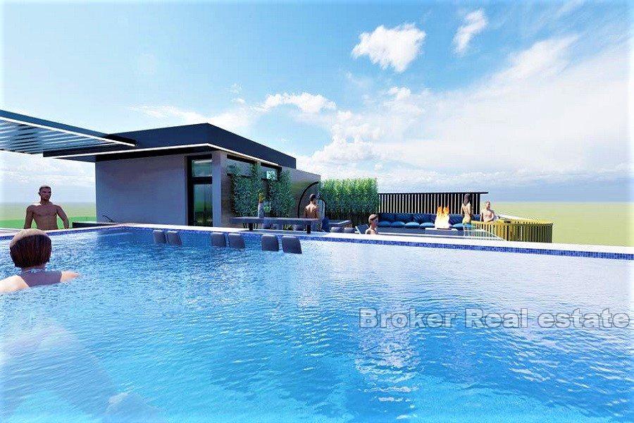 Attico con piscina e vista mare