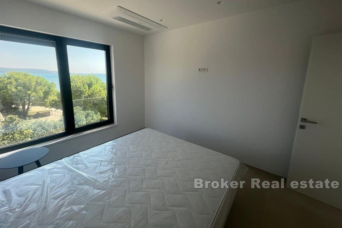 Three-story apartment first row to the sea