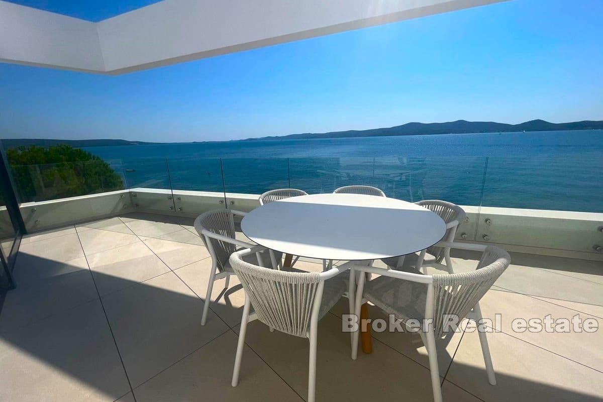 Three-story apartment first row to the sea