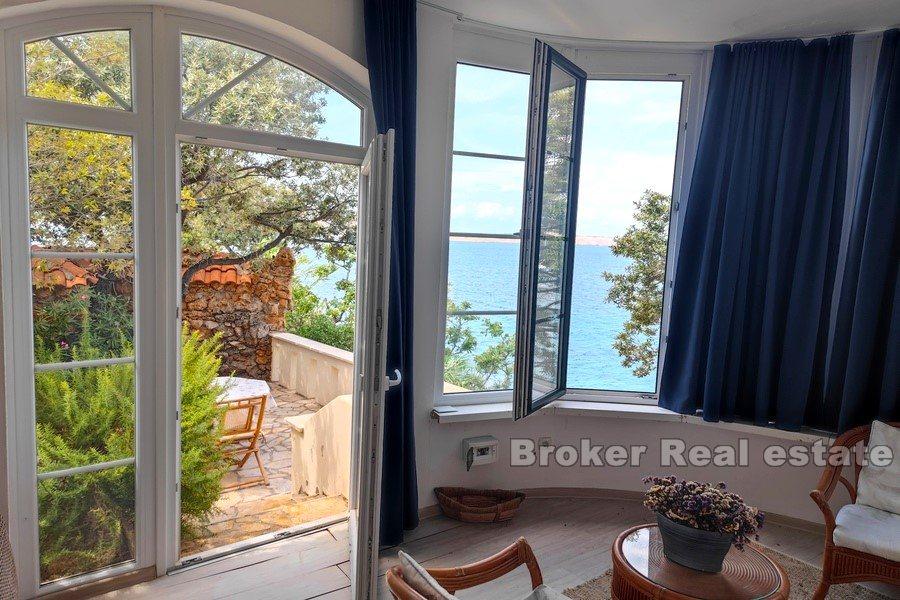 House by the sea and the beach