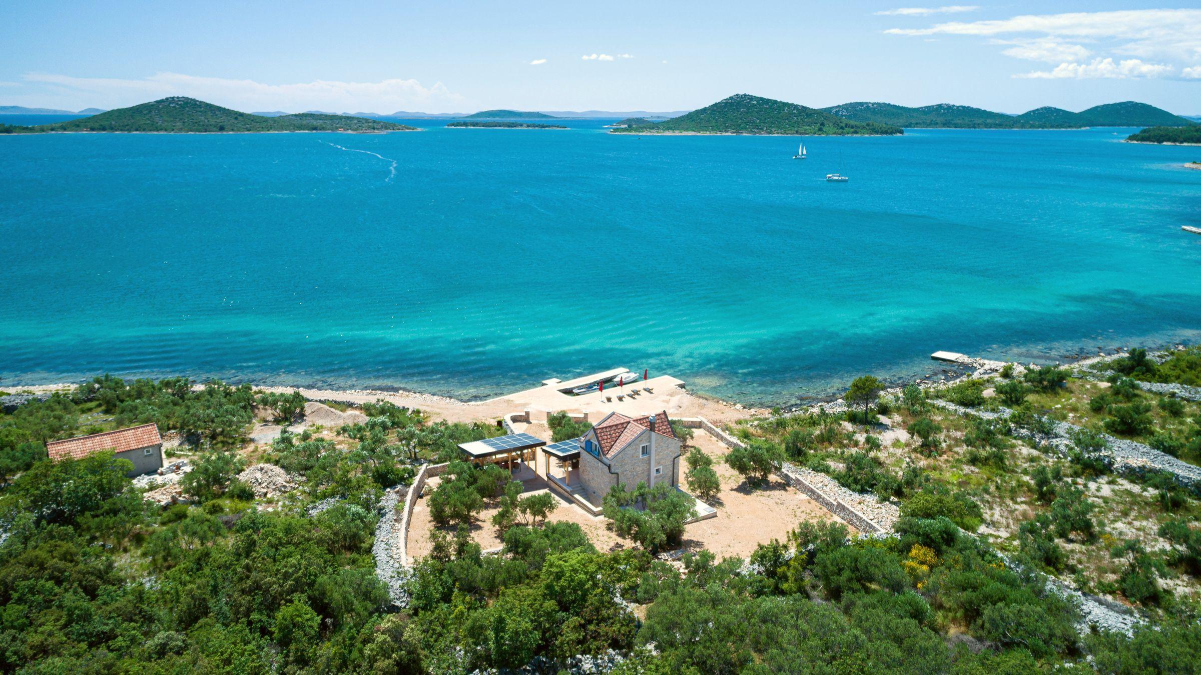 01-2021-355-near-Sibenik-stone-house-first-row-to-the-sea-for-sale