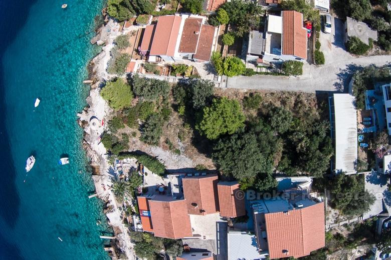 Exceptional building land plot at first row to the sea.