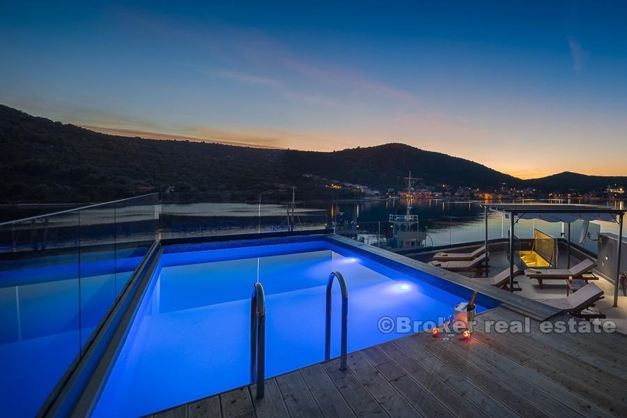 Elegant, new built villa, at first row to the sea