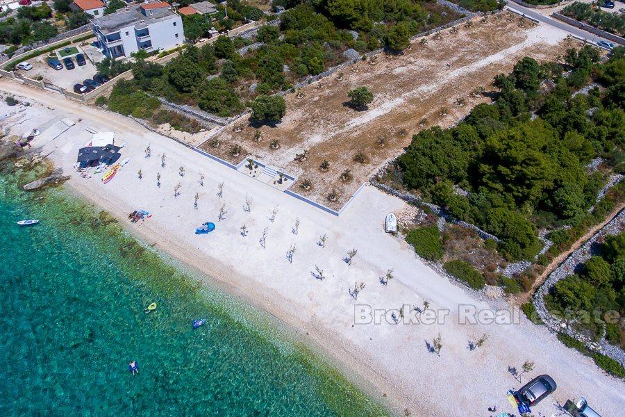 Terrain à bâtir, première rangée de la mer, à vendre