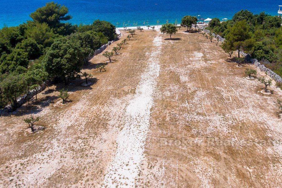 Terrain à bâtir, première rangée de la mer, à vendre