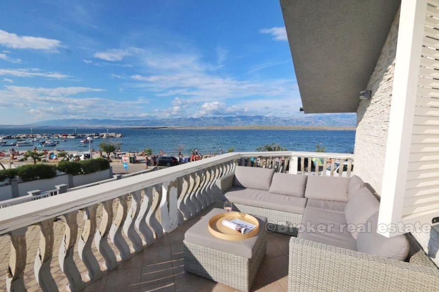 House at first row to the sea