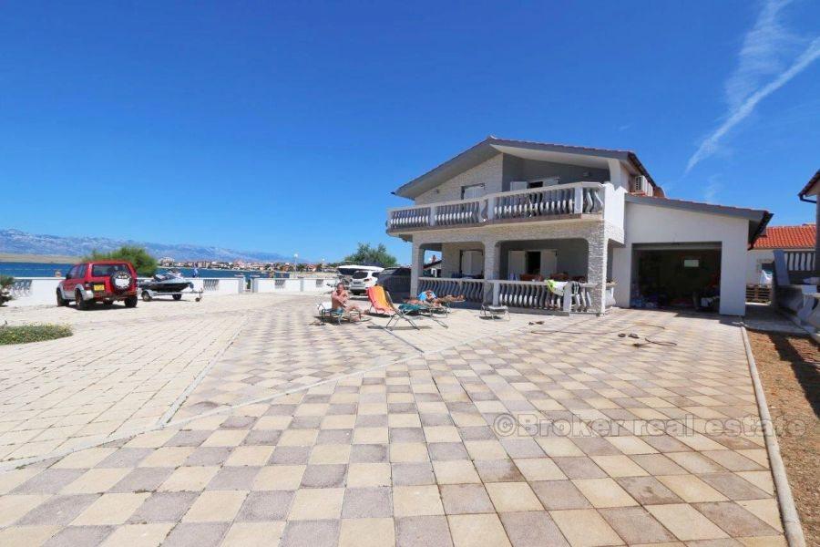 House at first row to the sea