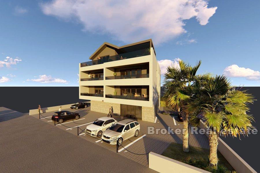Two and three bedrooms apartments in the first row to the sea
