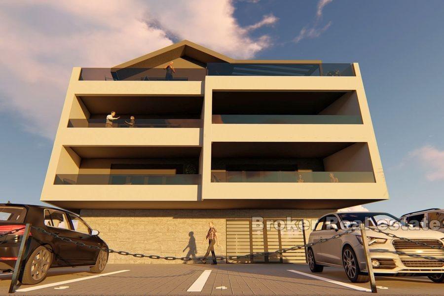 Two and three bedrooms apartments in the first row to the sea