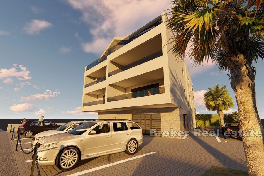 Two and three bedrooms apartments in the first row to the sea
