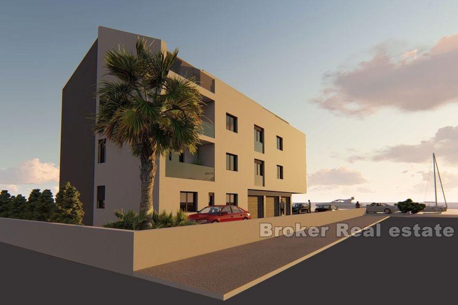 Two and three bedrooms apartments in the first row to the sea