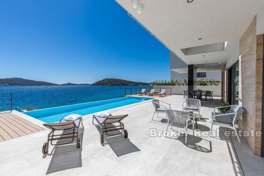 Newly built modern villa with pool, seafront