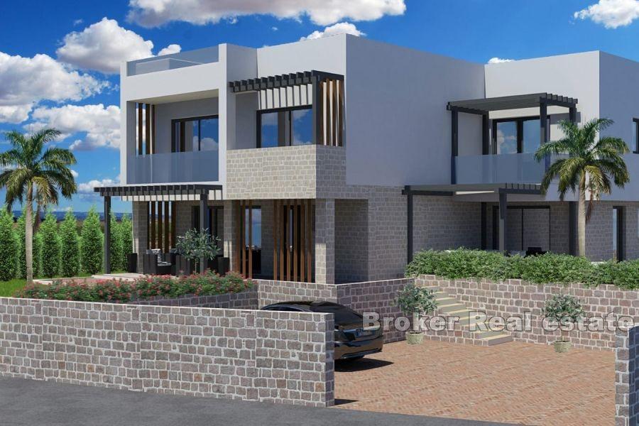 Casa con terrazza sul tetto e vista mare