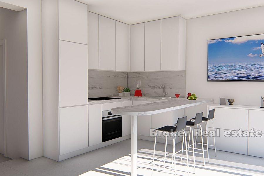 Villa with luxury apartments, first row to the sea