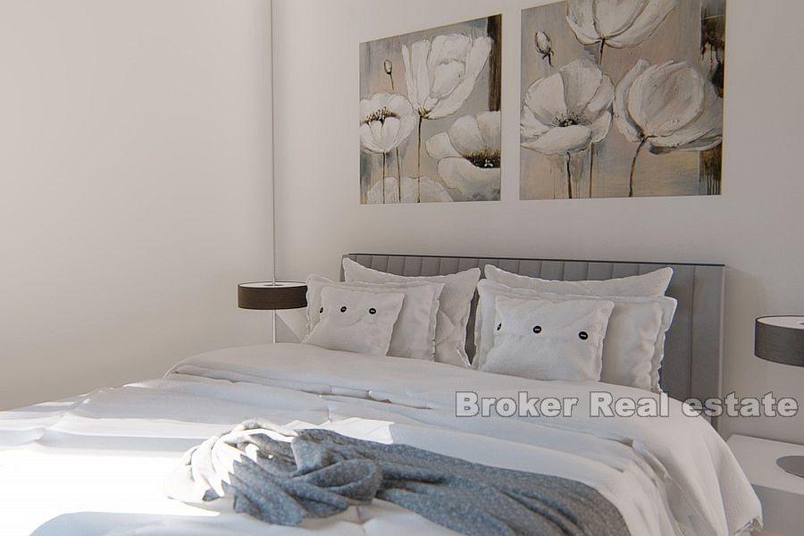 Villa with luxury apartments, first row to the sea