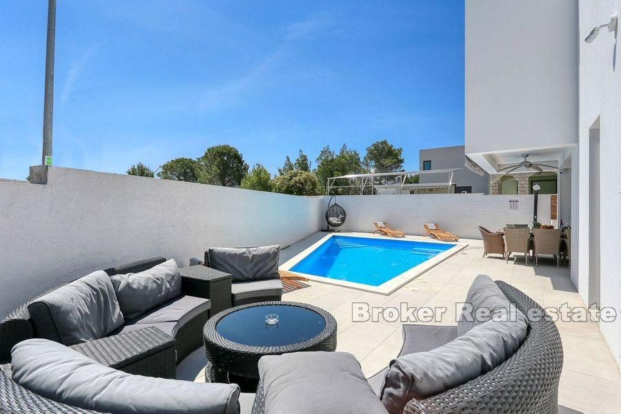 Modern semi-detached villa with pool near the sea