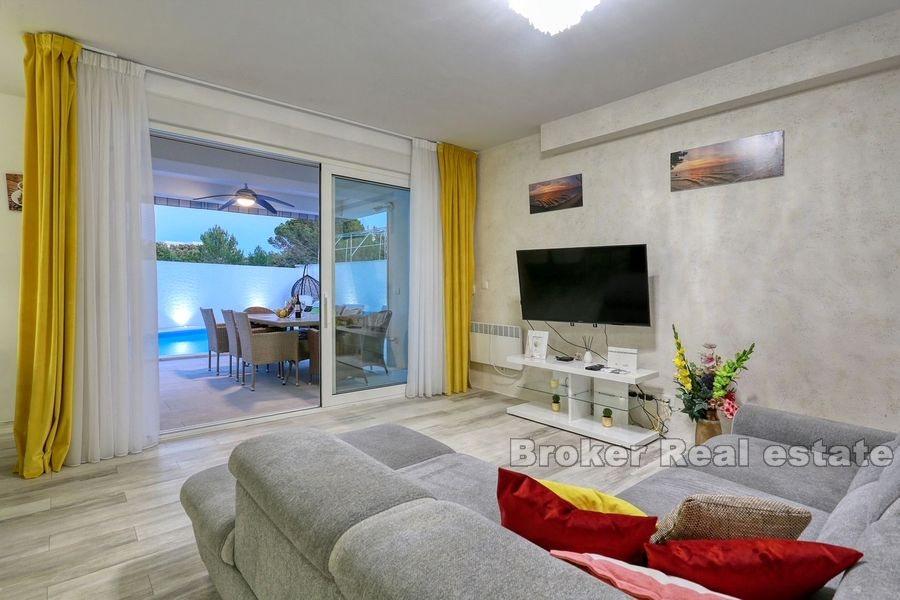 Modern semi-detached villa with pool near the sea