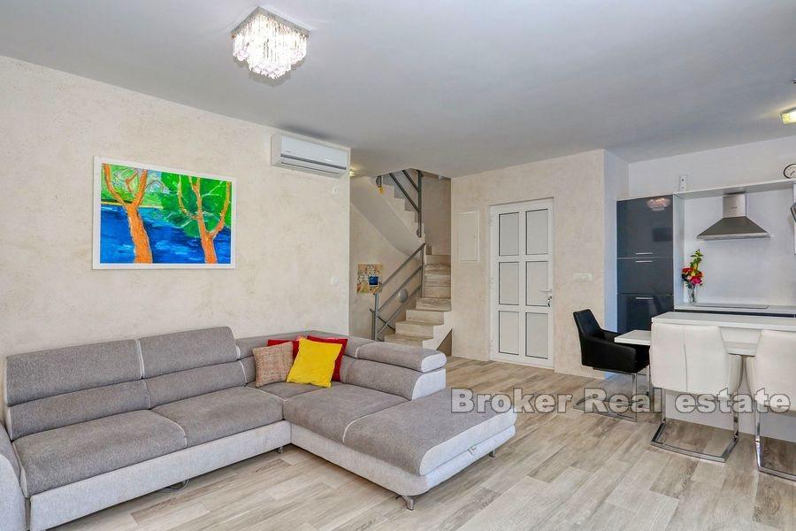 Modern semi-detached villa with pool near the sea
