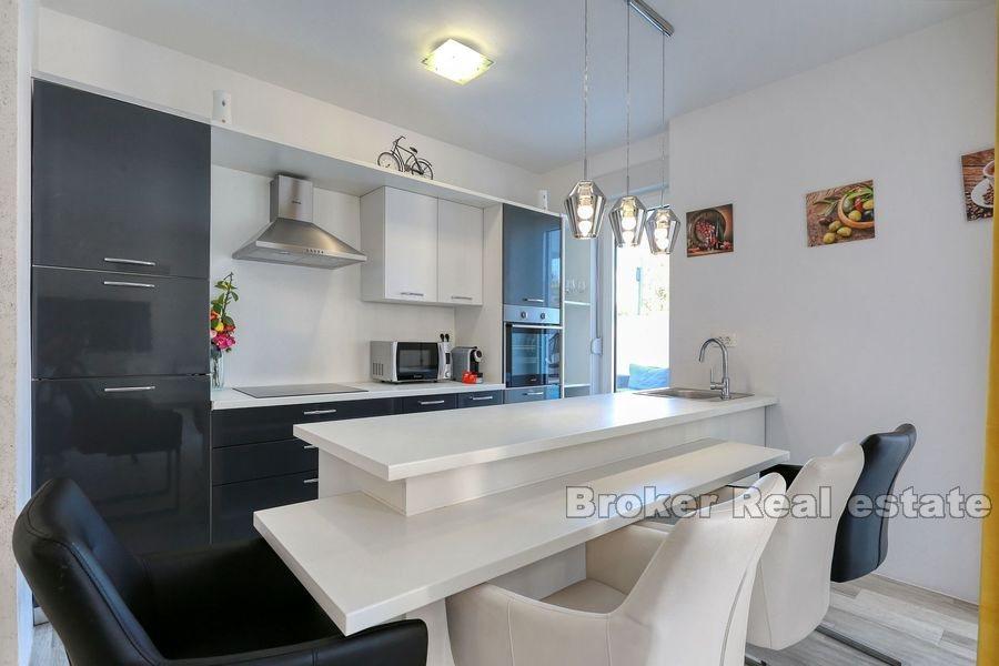 Modern semi-detached villa with pool near the sea
