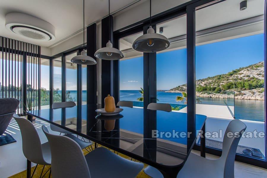 Modern villa with a pool by the sea