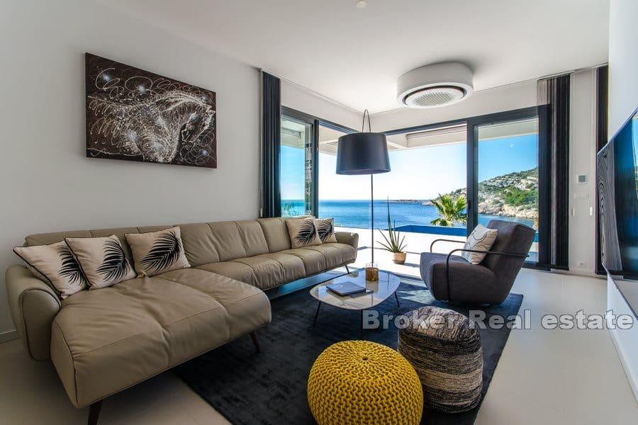 Modern villa with a pool by the sea