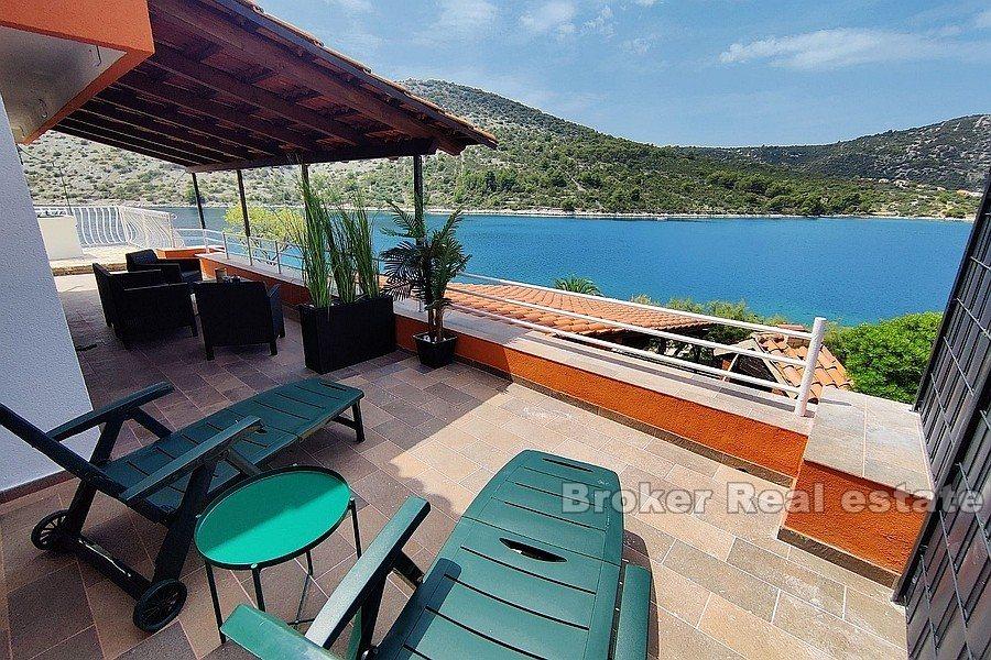 Renovated house in the first row to the sea