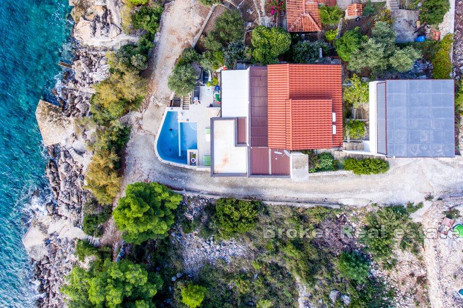 Maison au premier rang en bord de mer