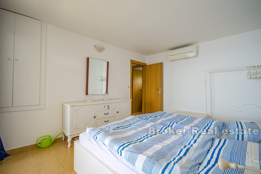 House first row by the sea