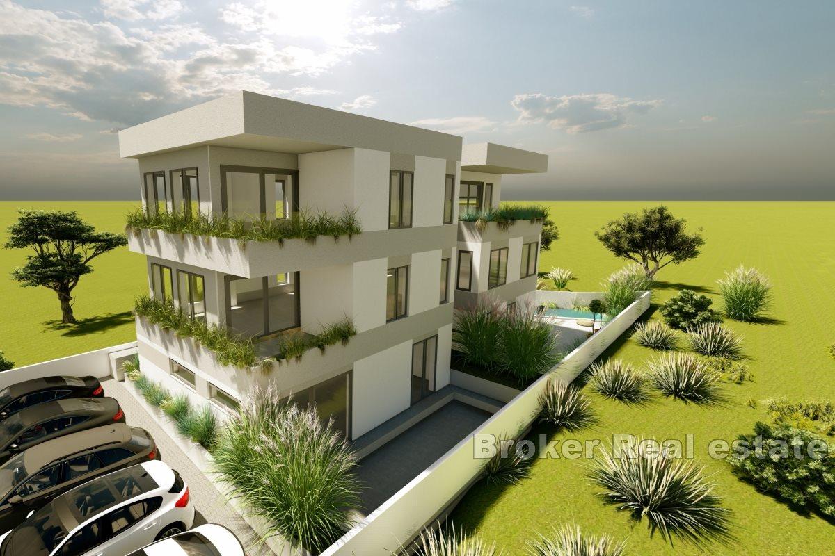 Apartments in a newly built apartment house with a swimming pool