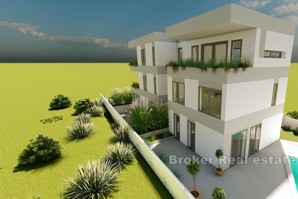 Apartments in a newly built apartment house with a swimming pool