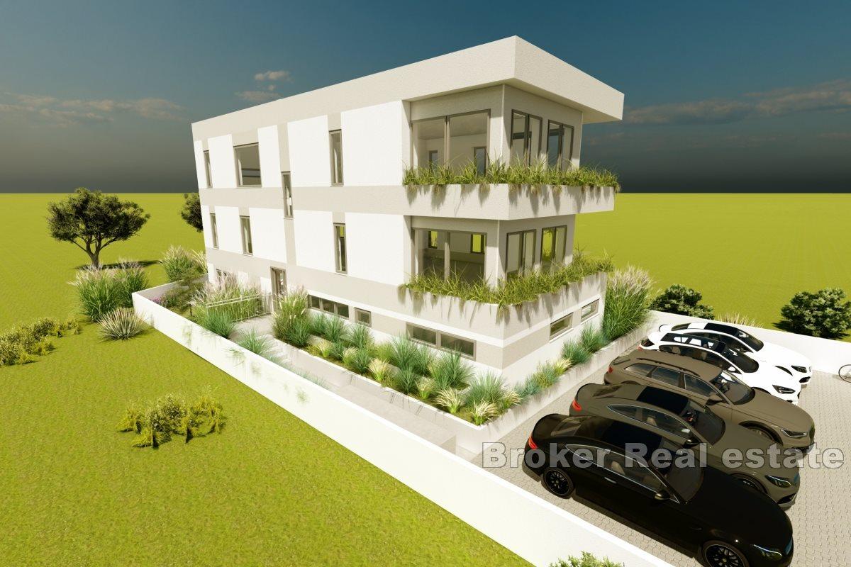 Apartments in a newly built apartment house with a swimming pool