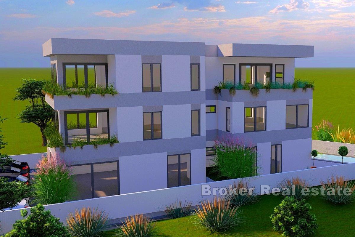 Apartments in a newly built apartment house with a swimming pool