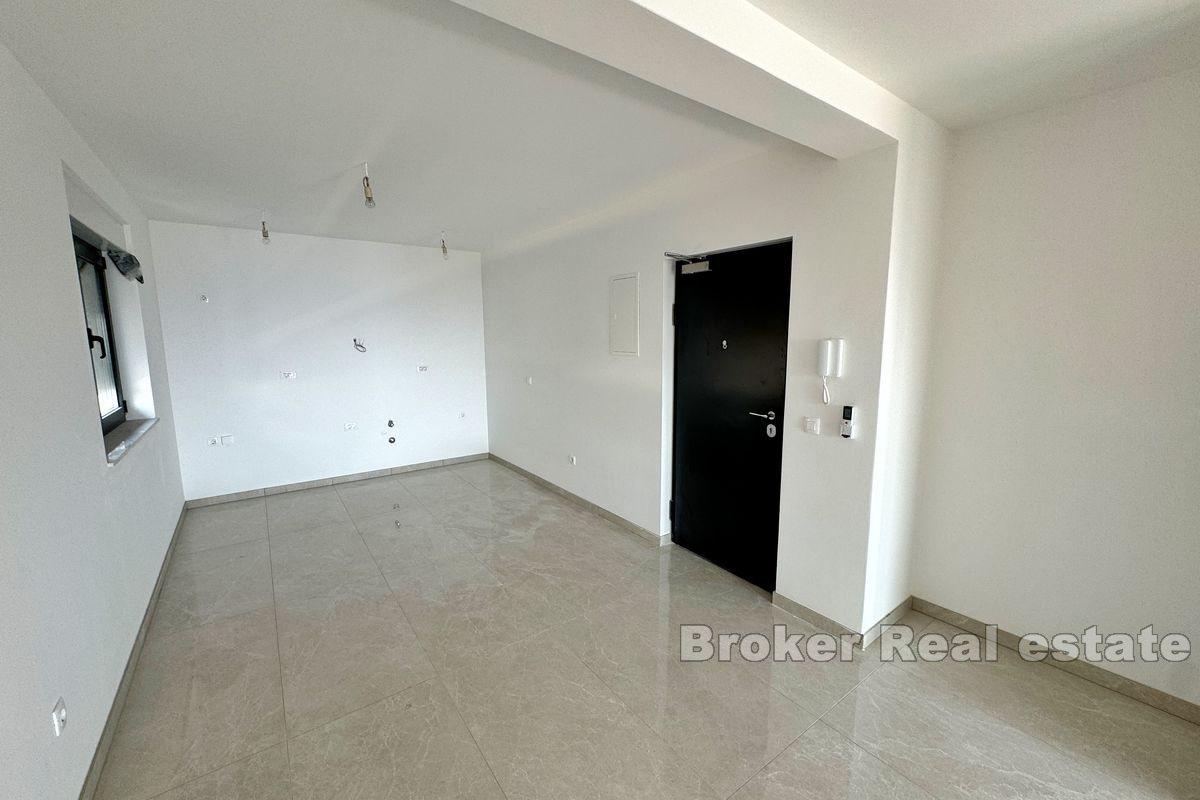 Novoizgrađeni dvosobni apartman s pogledom na more