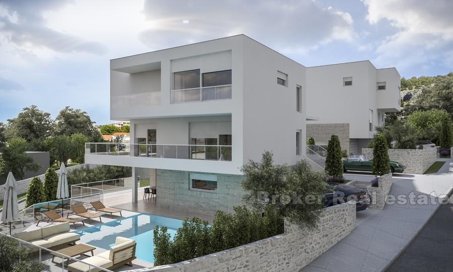 Modern villa with swimming pool in construction