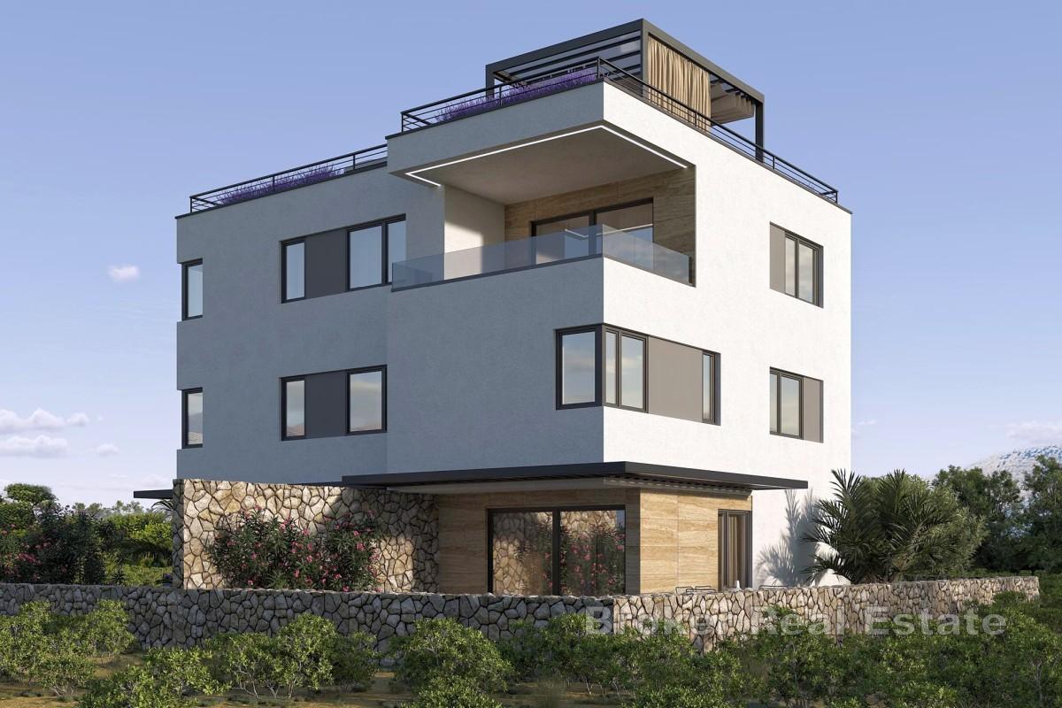 Appartamento duplex con giardino e piscina