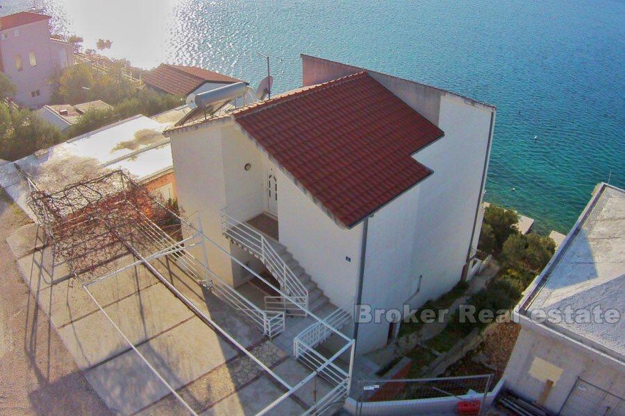 Apartment house at first row to the sea