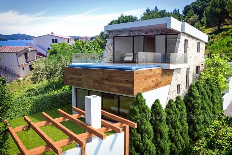 Nybyggd familje villa med pool till salu