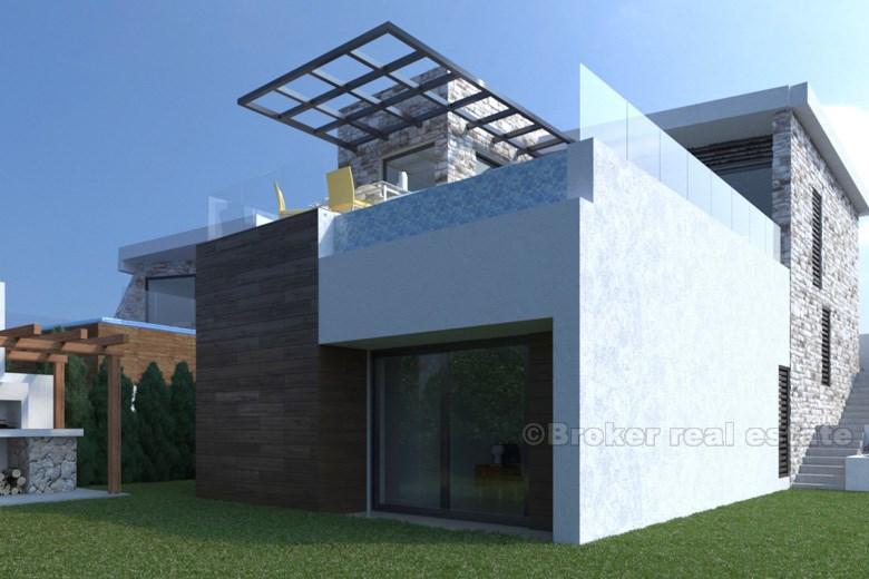 Modern villa med pool och havsutsikt till salu