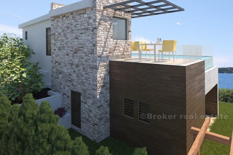 Modern villa med pool och havsutsikt till salu