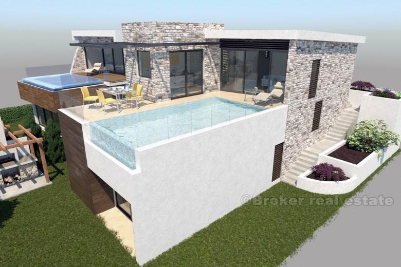 Modern villa med pool och havsutsikt till salu