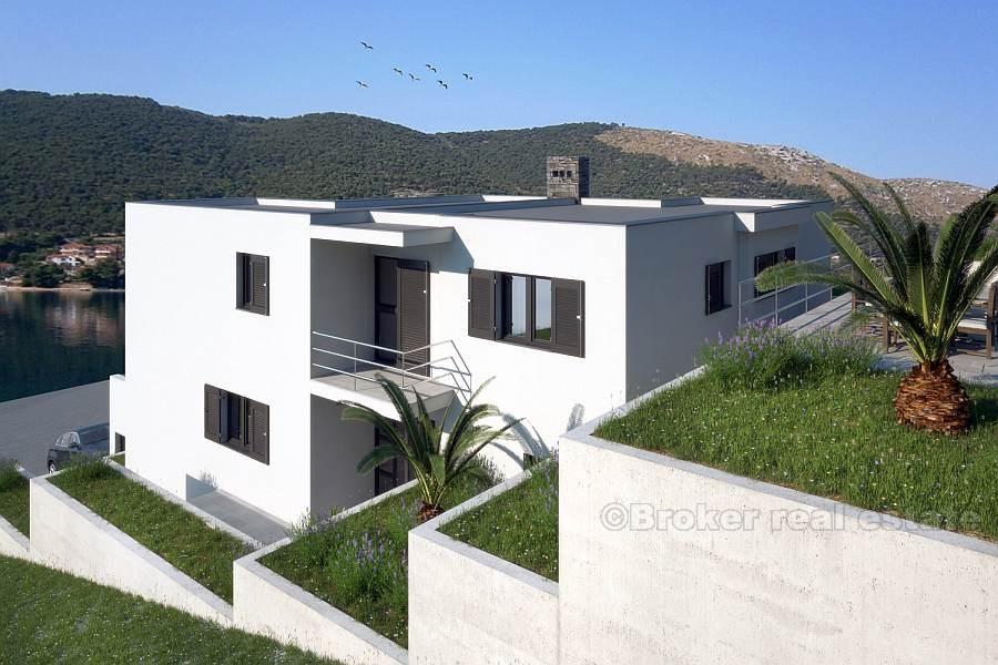 Новая вилла в первом ряду от моря