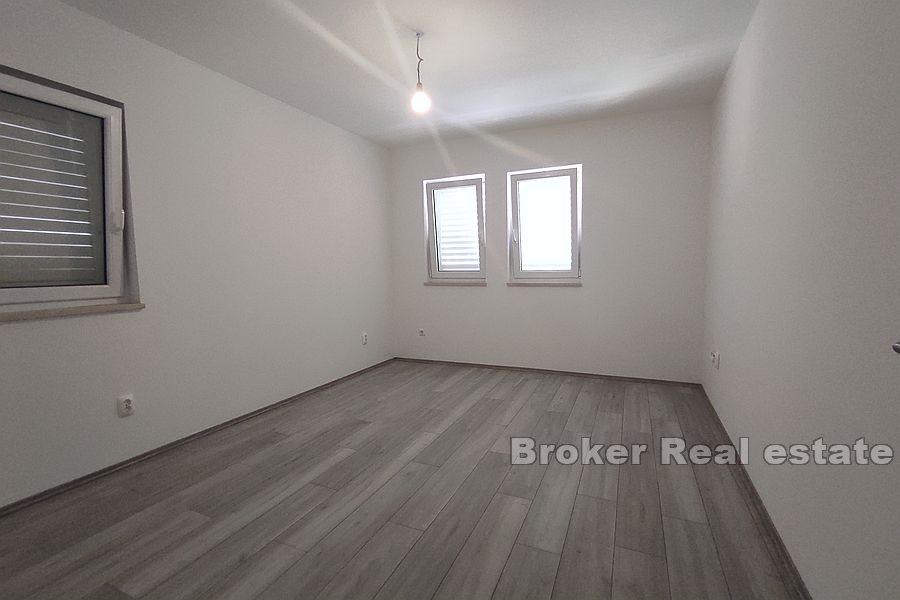 Nová menší obytná budova se 7 byty