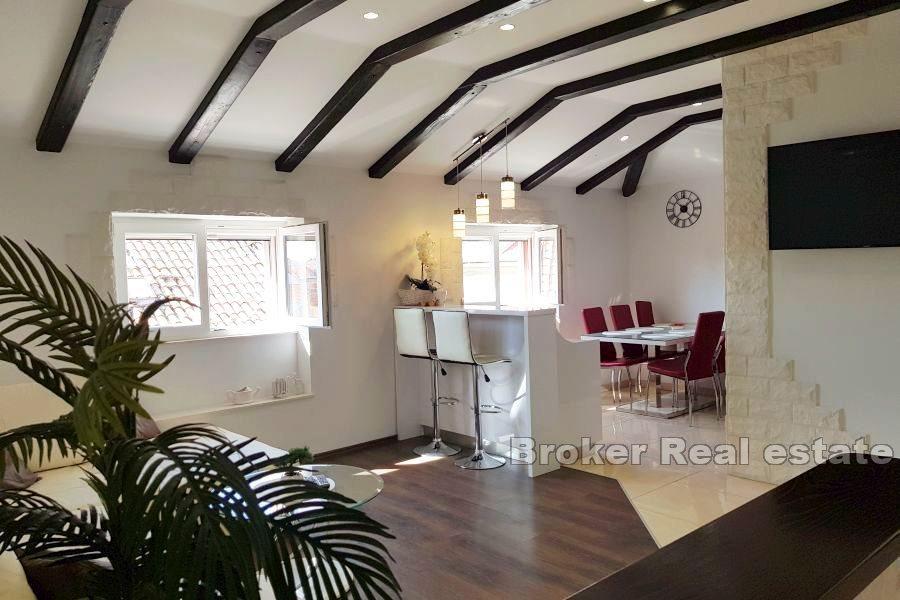 Comfortable attic apartment with a view of the city