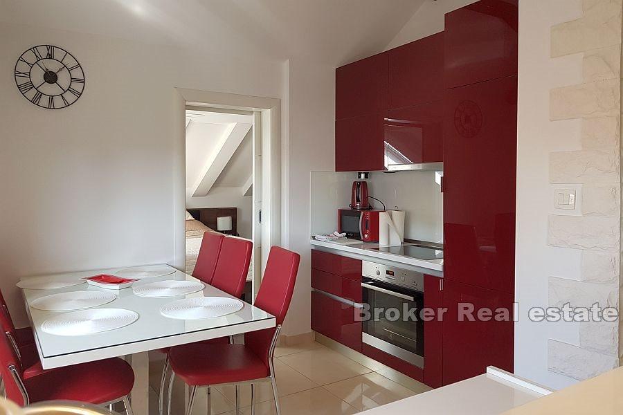 Comfortable attic apartment with a view of the city