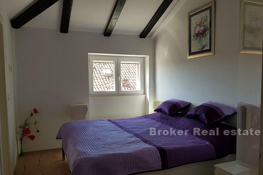 Comfortable attic apartment with a view of the city