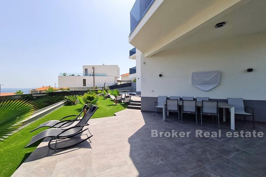 New villa with pool and sea view
