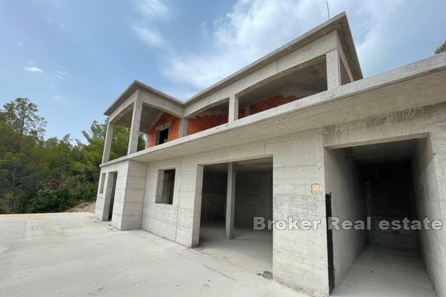 Unfinished house with pool, first row to the sea