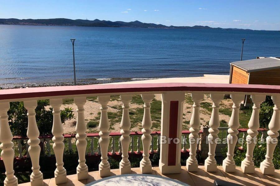 Apartment house, first row to the sea