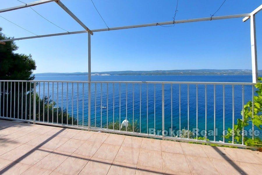 Maison jumelée au premier rang de la mer