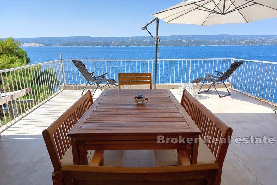 Maison jumelée au premier rang de la mer